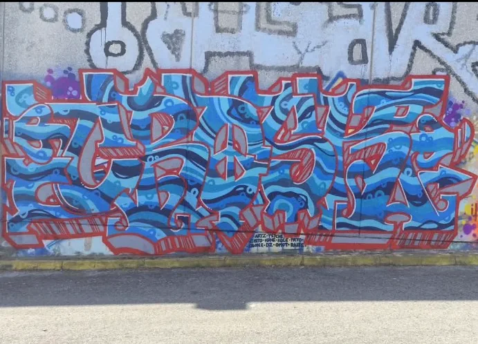 Blue graffiti wall piece